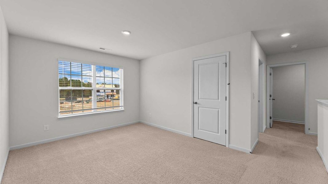 Spacious, unfurnished interior of a new home in Beaver Dam Crossing, Bailey (Image 14).