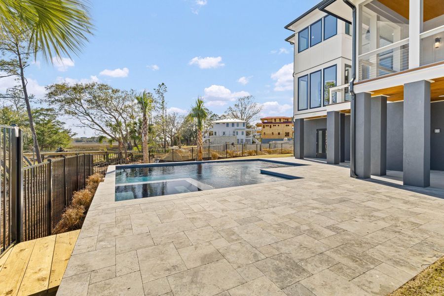 Exterior details and patio area of a home in , Charleston (Image 44).