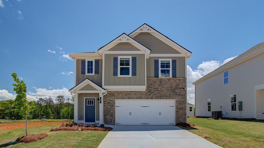 Representative exterior photo of a completed home built from the Layla II by DRB Homes in Enclave at Evergreen, Fairburn, GA (Image 21).