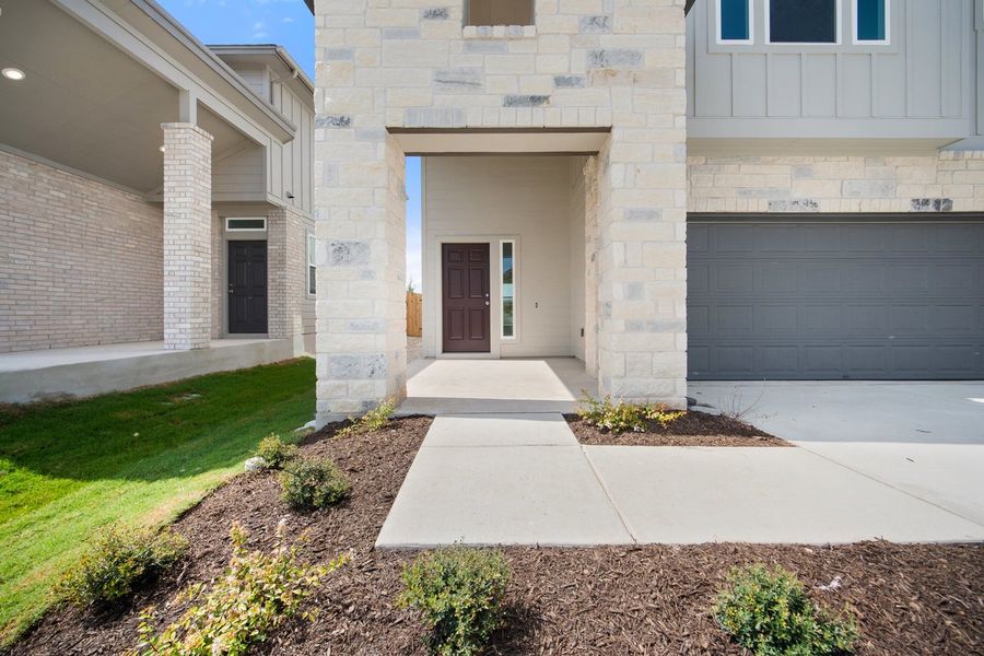 Exterior details and patio area of a home in Porter Country, Buda (Image 3). Exterior details and patio area of a home in Porter Country, Buda (Image 3).