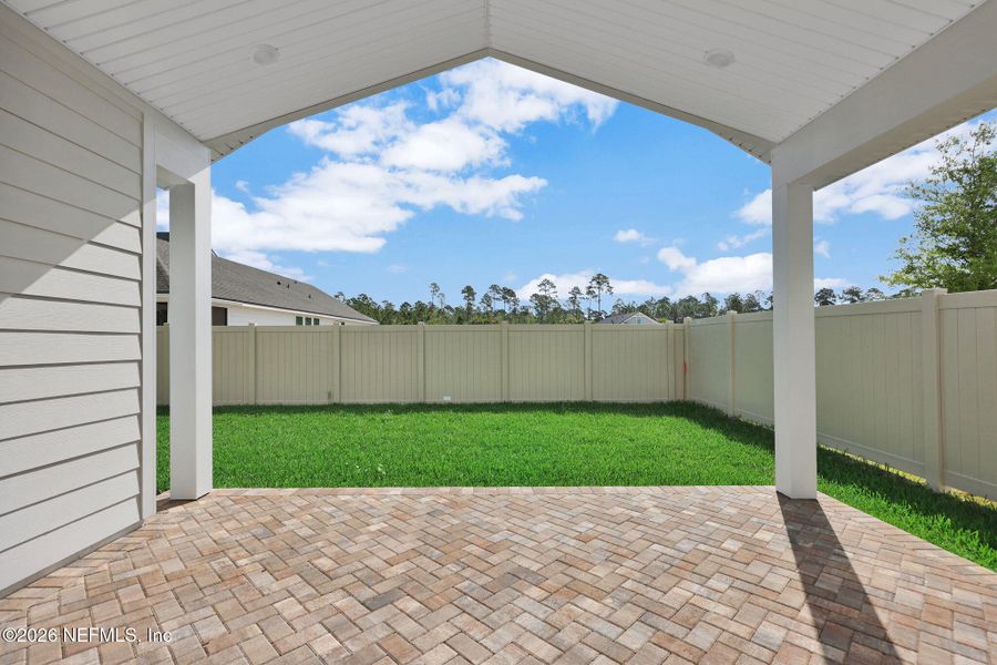 Exterior details and patio area of a home in Seabrook Village at Seabrook, Nocatee (Image 32).