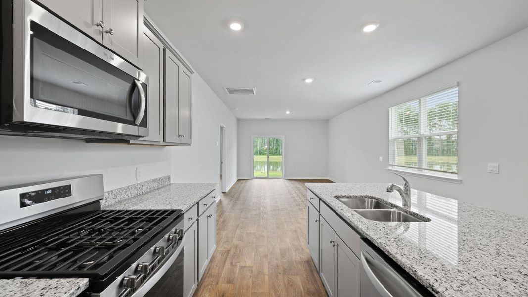 Furnished interior view inside a new home in Pine Hills at Cane Bay, Summerville (Image 6). Furnished interior view inside a new home in Pine Hills at Cane Bay, Summerville (Image 6).