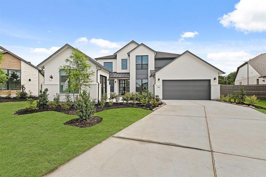 Representative exterior photo of a completed home built from the The Paso Robles by Westin Homes in ARTAVIA® - 65' Art Collection, Conroe, TX (Image 18).