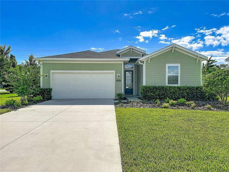 Front exterior of a new home in , Ormond Beach, FL, highlighting curb appeal (Image 1). Front exterior of a new home in , Ormond Beach, FL, highlighting curb appeal (Image 1).