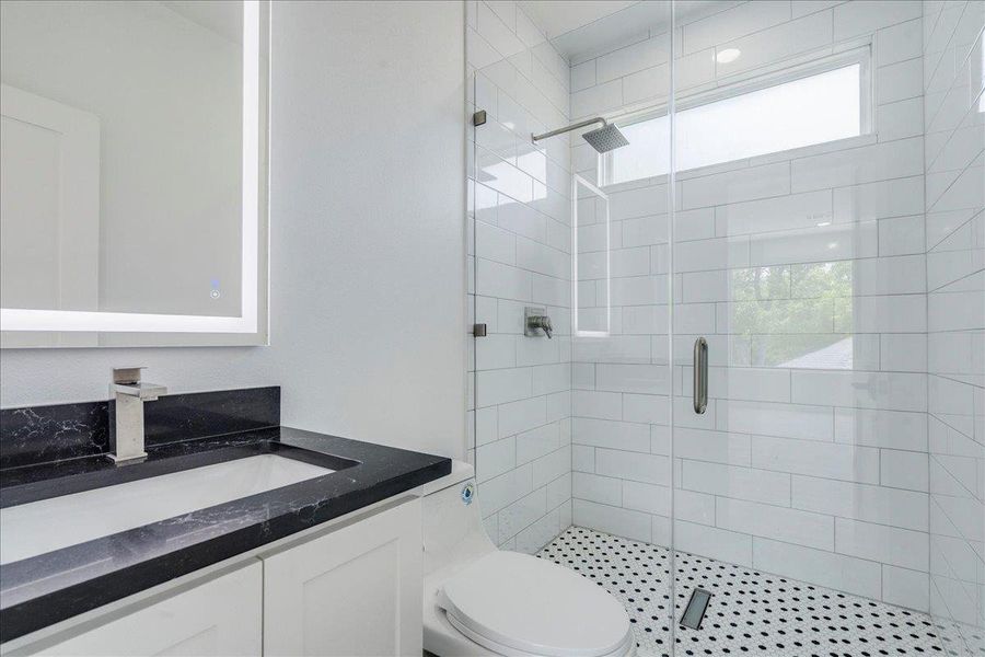 Full bath featuring vanity and stand up shower Full bath featuring vanity and stand up shower