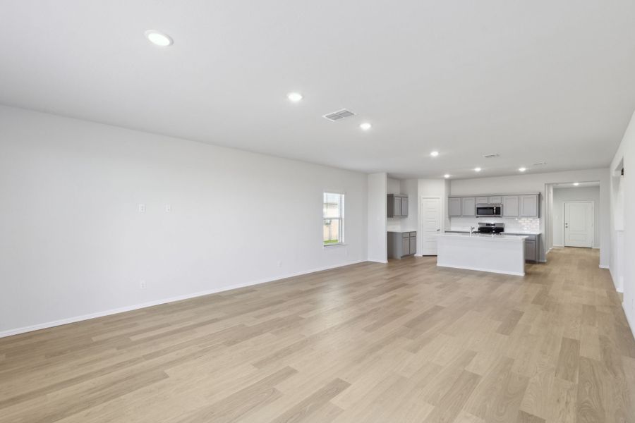 Open First Floor in the Holden home plan by Trophy Signature Homes – REPRESENTATIVE PHOTO