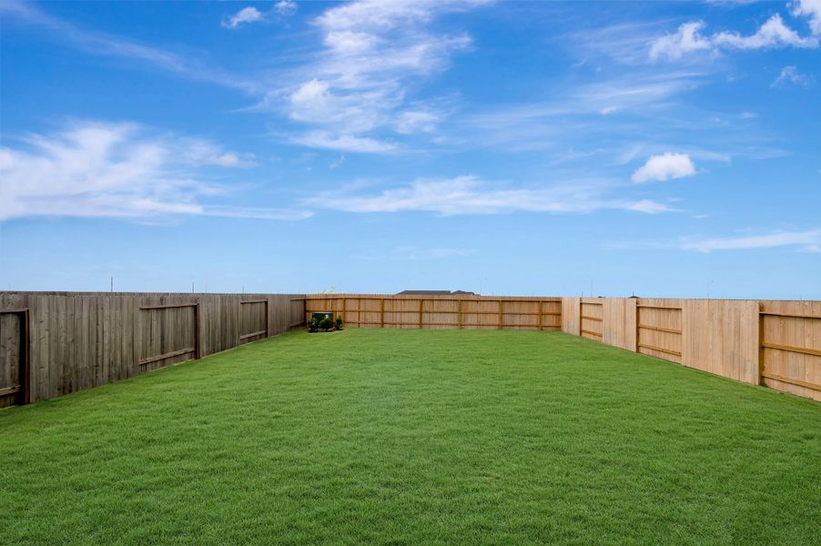 Exterior details and patio area of a home in Mason Woods, Cypress (Image 23).
