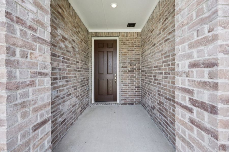 Exterior details and patio area of a home in Heartland Signature, Crandall (Image 2). Exterior details and patio area of a home in Heartland Signature, Crandall (Image 2).