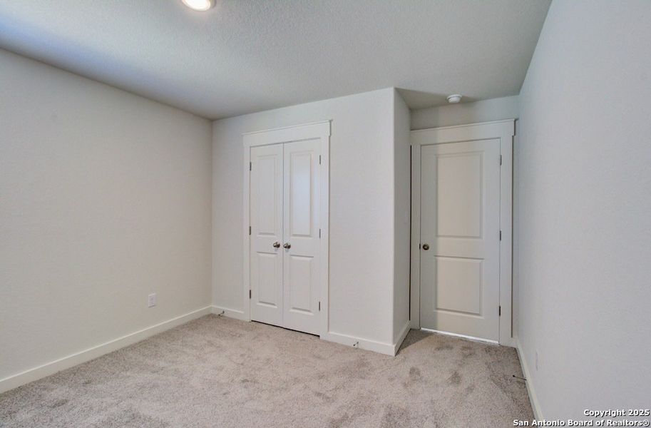 Spacious, unfurnished interior of a new home in Prairie Green, Converse (Image 17). Spacious, unfurnished interior of a new home in Prairie Green, Converse (Image 17).