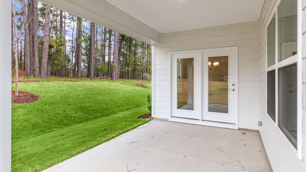 Exterior details and patio area of a home in The Villas at Martin Farms, Aberdeen (Image 4).