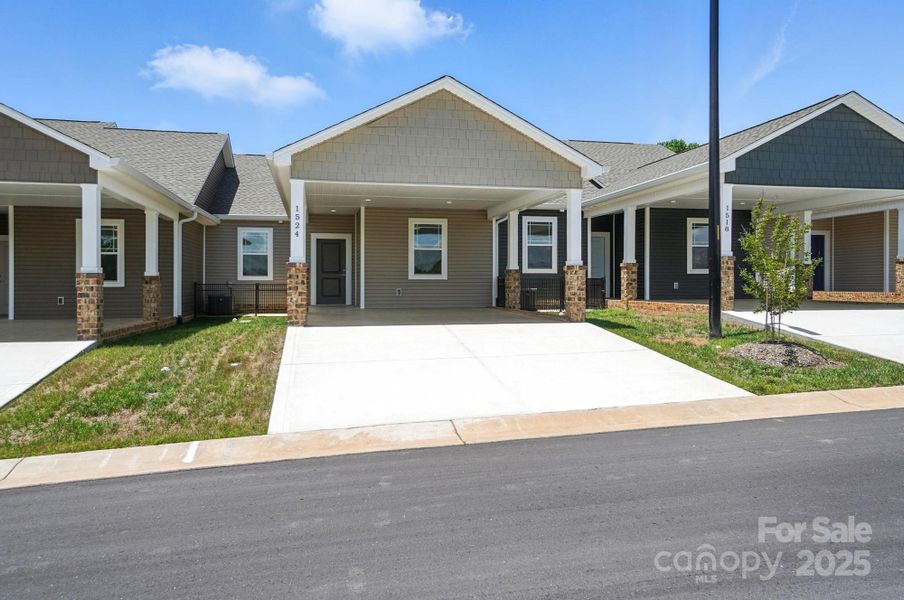 Front exterior of a new home in , Hickory, NC, highlighting curb appeal (Image 24).
