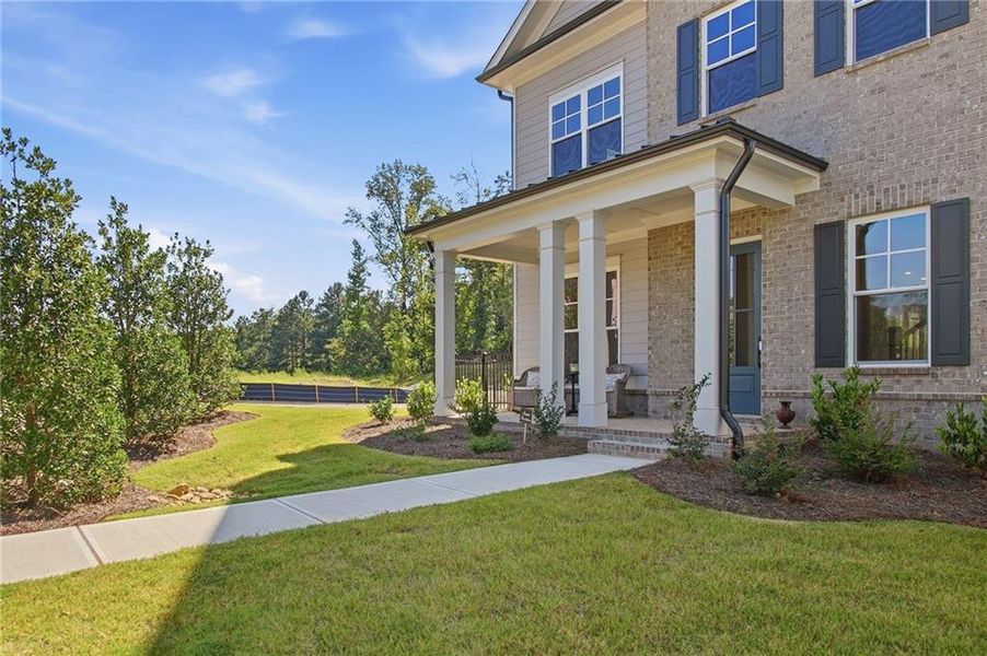 Exterior details and patio area of a home in Waterside Single Family, Peachtree Corners (Image 3).