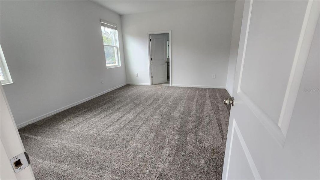 Spacious, unfurnished interior of a new home in Knightsbridge, Kissimmee (Image 14).