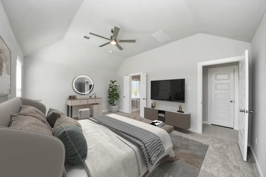 VS. Another perspective unveils a comprehensive view of the serenity and comfort this primary suite offers. Sample photo of completed home with similar floor plan. Actual colors and selections may vary. VS. Another perspective unveils a comprehensive view of the serenity and comfort this primary suite offers. Sample photo of completed home with similar floor plan. Actual colors and selections may vary.