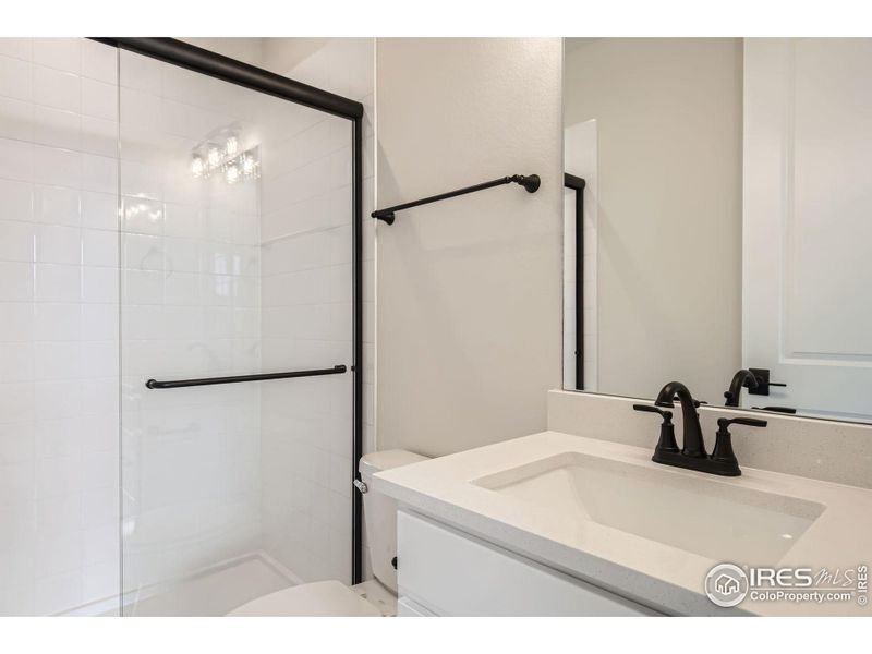 Furnished interior view inside a new home in RainDance National 60/70, Windsor (Image 7).