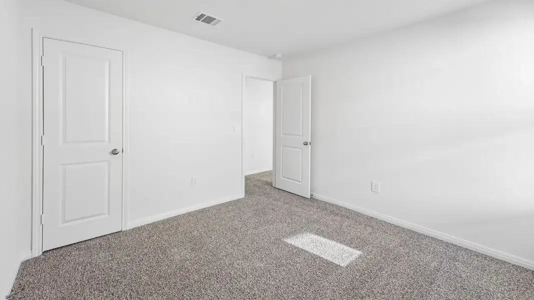 Spacious, unfurnished interior of a new home in Bar W Ranch, Leander (Image 31).