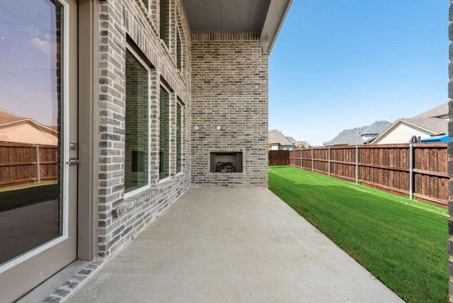Exterior details and patio area of a home in South Pointe, Mansfield (Image 4). Exterior details and patio area of a home in South Pointe, Mansfield (Image 4).