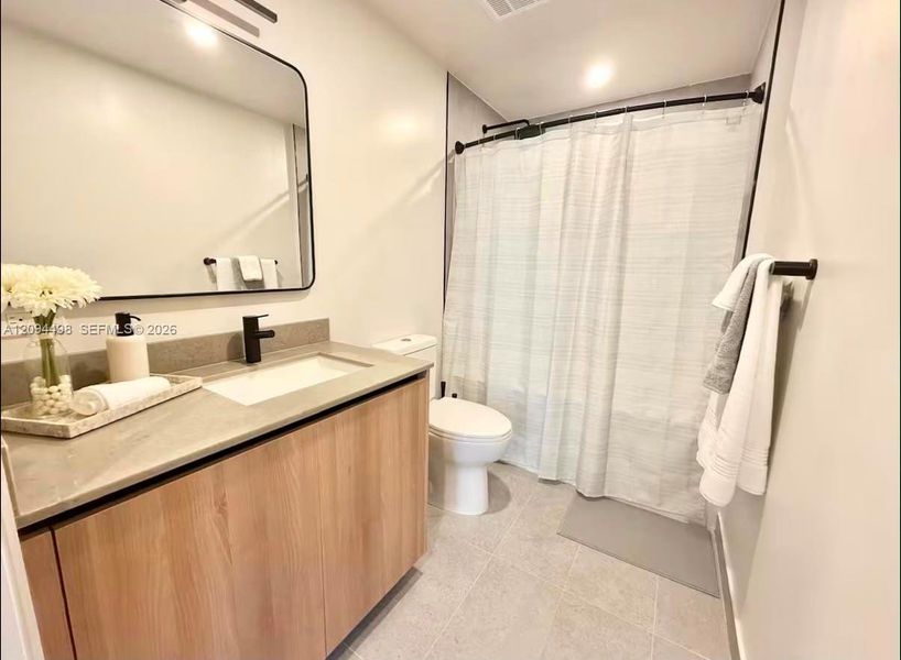 Furnished interior view inside a new home in , Miami (Image 9).