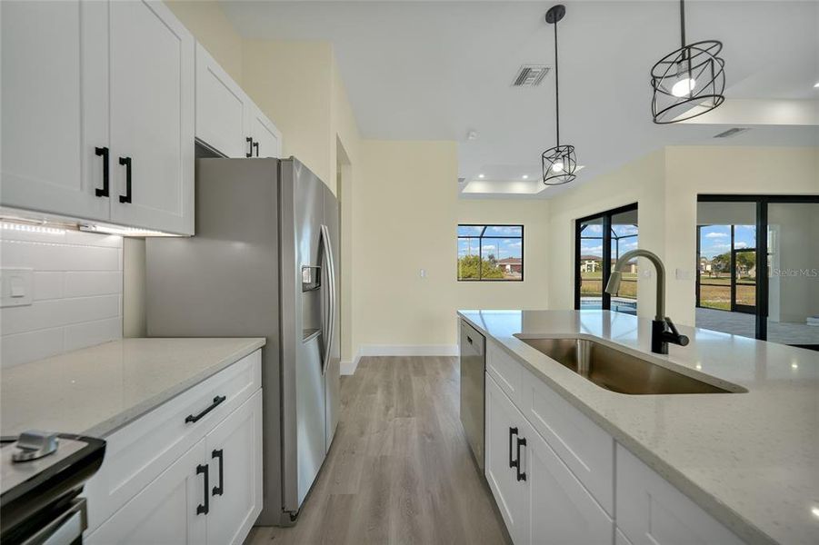 Furnished interior view inside a new home in , Cape Coral (Image 13). Furnished interior view inside a new home in , Cape Coral (Image 13).