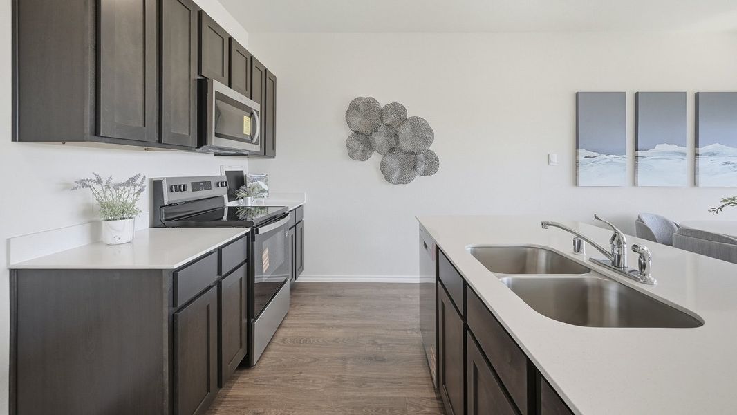 Representative furnished interior of a home built from the Argentina by D.R. Horton in Arbor Trails South, Princeton (Image 6).