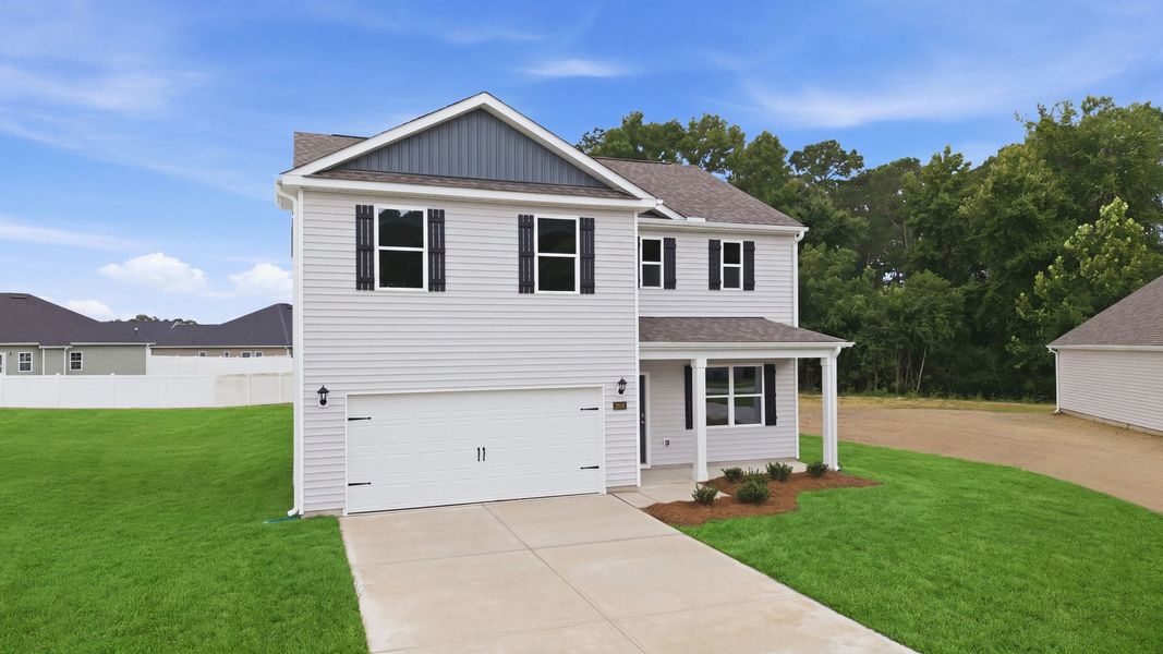 Front exterior of a new home in Villa Grande, Winterville, NC, highlighting curb appeal (Image 2). Front exterior of a new home in Villa Grande, Winterville, NC, highlighting curb appeal (Image 2).