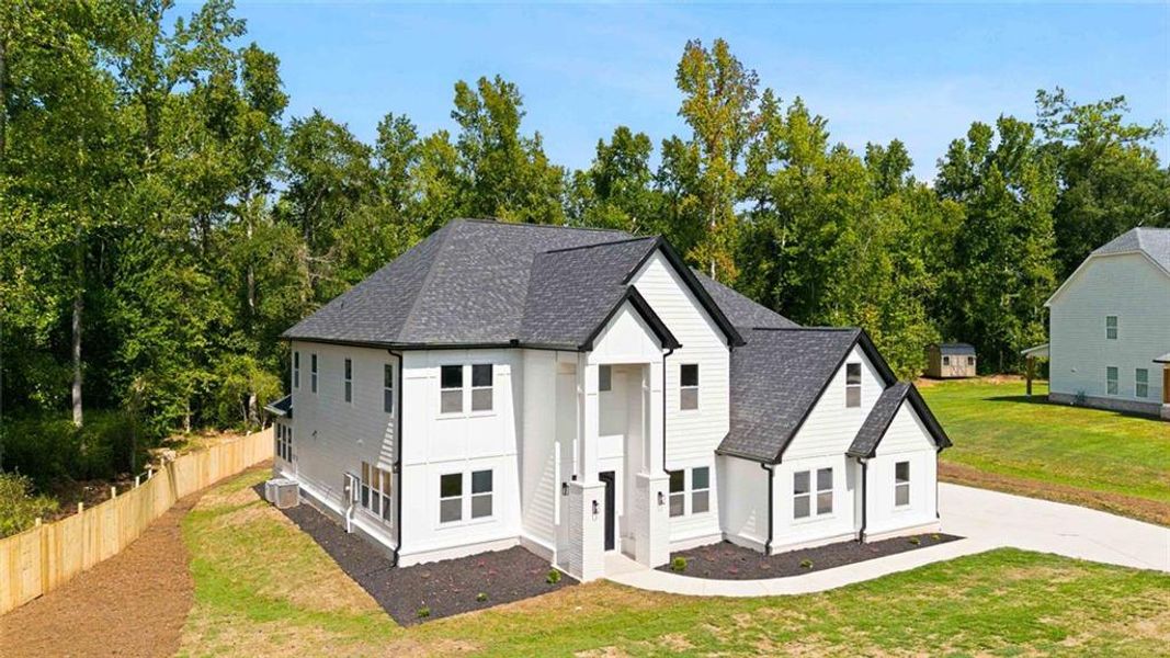 Front exterior of a new home in , Griffin, GA, highlighting curb appeal (Image 25).