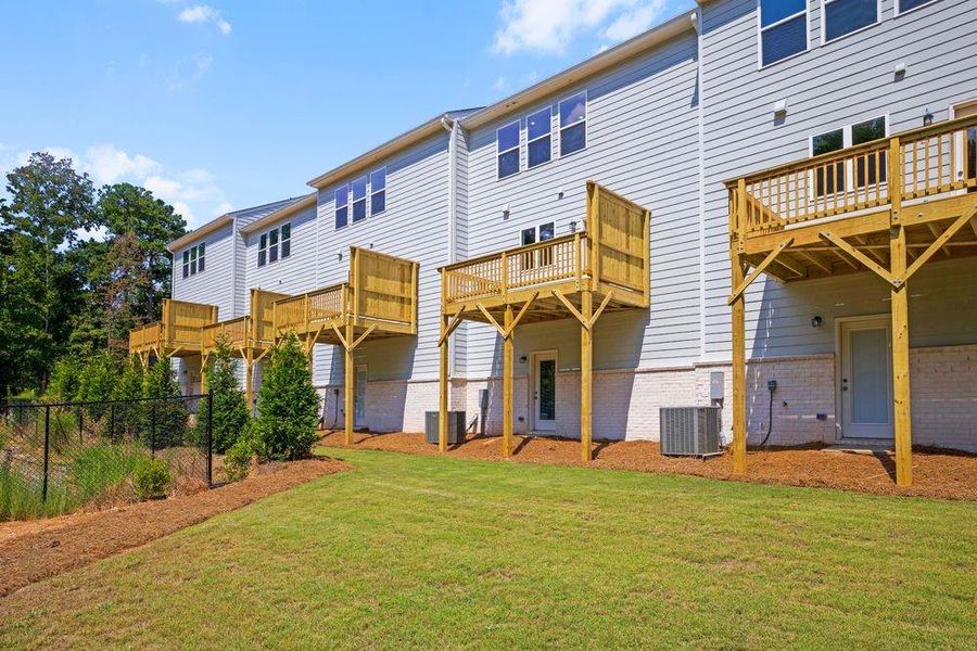 Front exterior of a new home in Somerset at Veterans Memorial, Mableton, GA, highlighting curb appeal (Image 27).