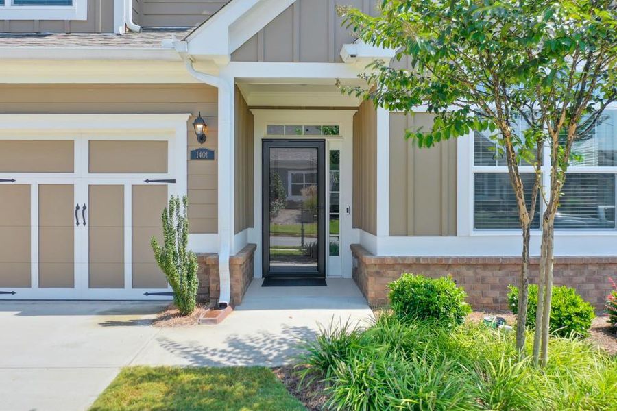 Front exterior of a new home in , Cumming, GA, highlighting curb appeal (Image 2).