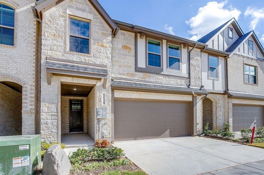 Front exterior of a new home in , Mansfield, TX, highlighting curb appeal (Image 23).