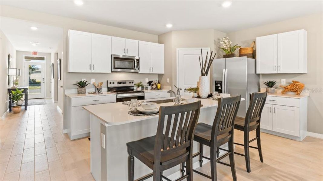 Furnished interior view inside a new home in Central Parc, North Port (Image 7).