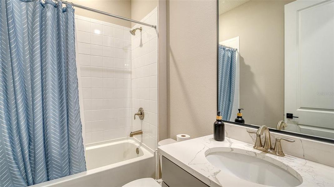 Furnished interior view inside a new home in Star Farms at Lakewood Ranch, Bradenton (Image 29).