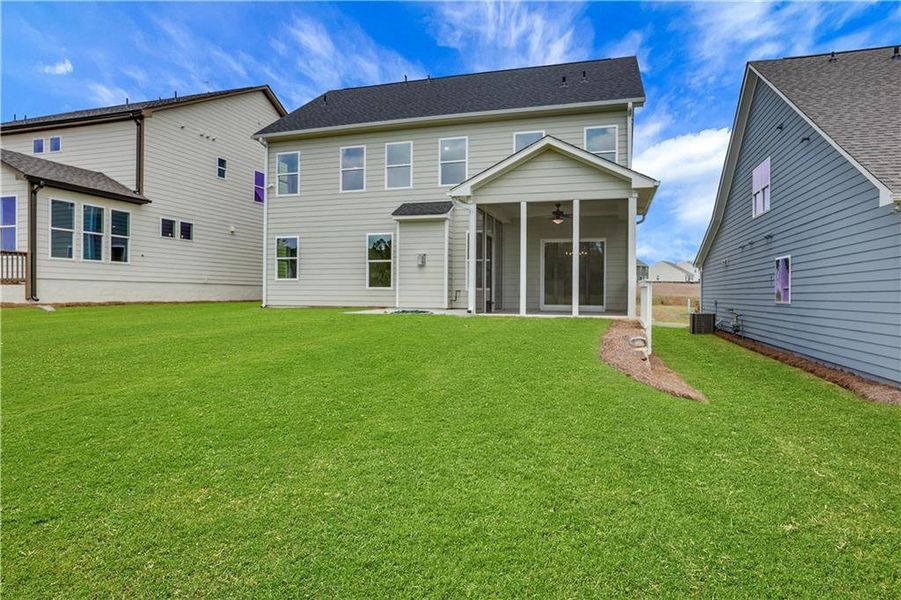 Front exterior of a new home in Twin Lakes, Hoschton, GA, highlighting curb appeal (Image 21). Front exterior of a new home in Twin Lakes, Hoschton, GA, highlighting curb appeal (Image 21).