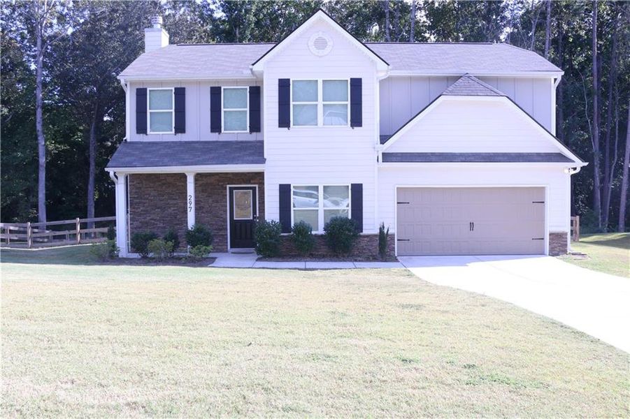 Front exterior of a new home in , Dallas, GA, highlighting curb appeal (Image 2). Front exterior of a new home in , Dallas, GA, highlighting curb appeal (Image 2).