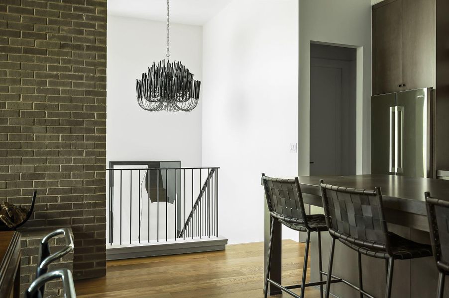 Stunning sculptural designer lighting is found  throughout the home