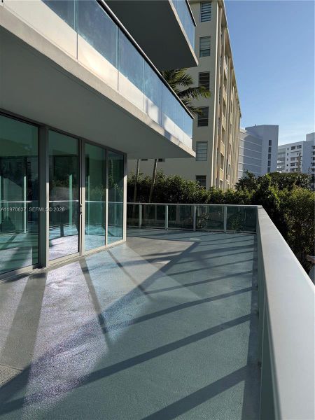 Condo located in Bay Harbor Islands, FL showcasing its design and architecture (Image 3).