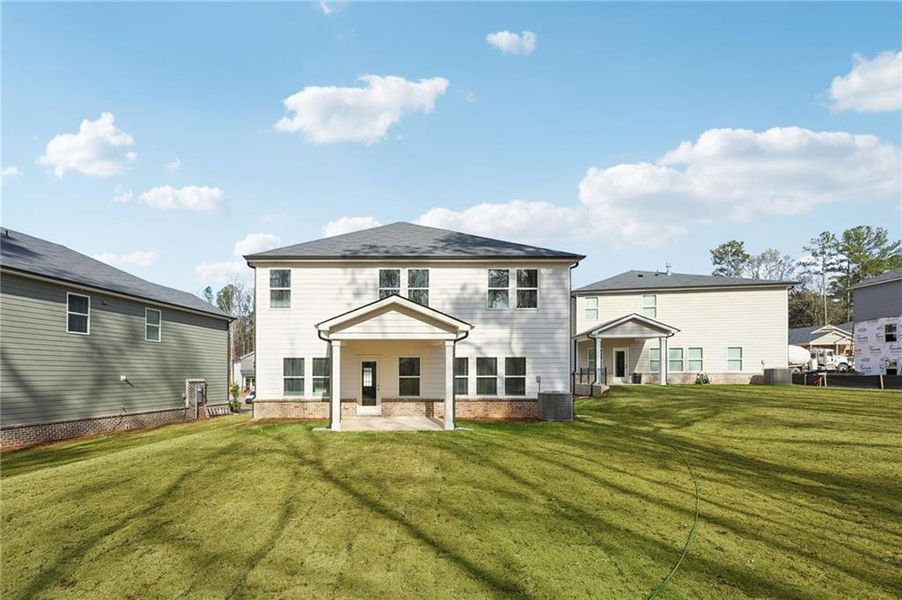 Exterior details and patio area of a home in Westmont Preserve, Powder Springs (Image 25).