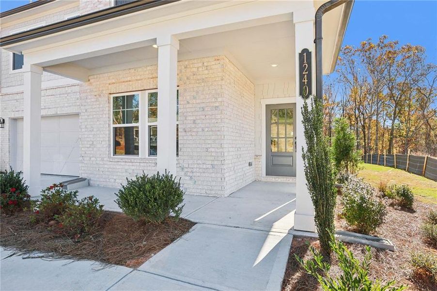 Exterior details and patio area of a home in Arbors at Richland Creek, Buford (Image 19). Exterior details and patio area of a home in Arbors at Richland Creek, Buford (Image 19).