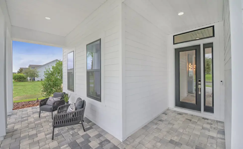 Exterior details and patio area of a home in Oakmont, Gainesville (Image 20).