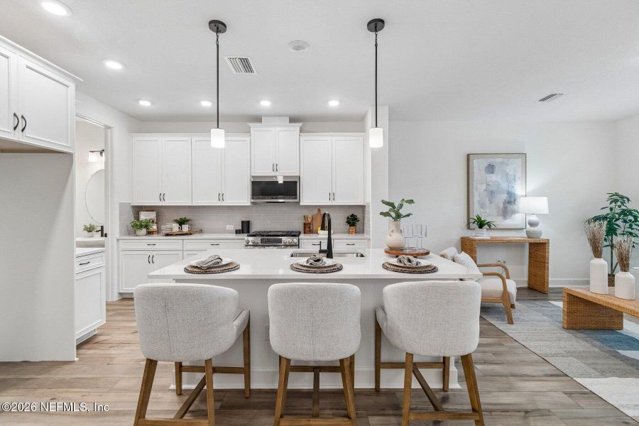 Furnished interior view inside a new home in Westerly Park at Wildlight - Courtyard Collection, Yulee (Image 17).