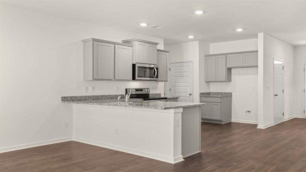 Furnished interior view inside a new home in Champion's Run, Lithonia (Image 8).