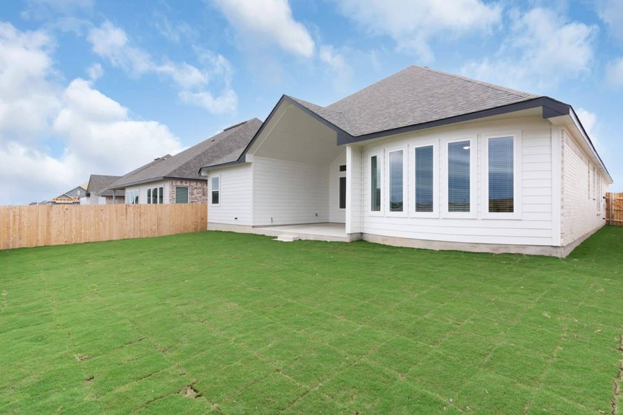 Exterior details and patio area of a home in The Grove at Blackhawk, Pflugerville (Image 26).