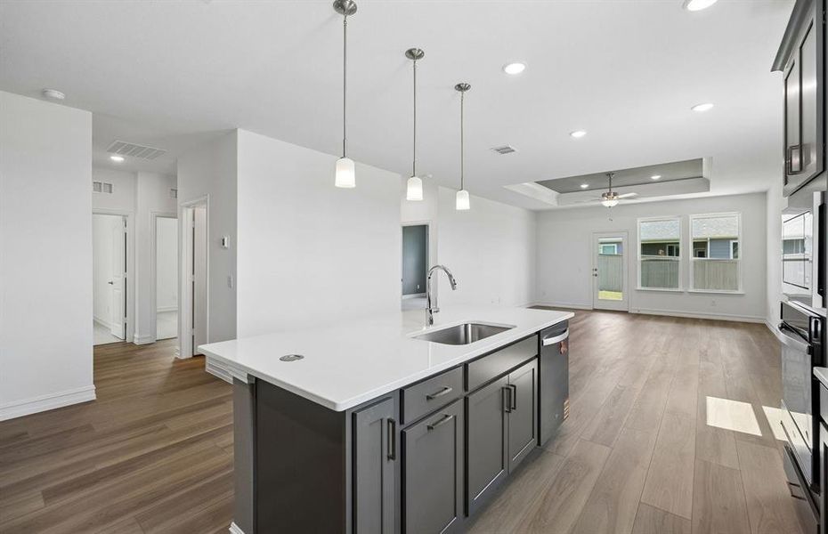 Spacious kitchen overlooking gathering area Spacious kitchen overlooking gathering area