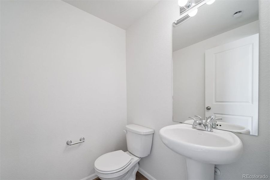Furnished interior view inside a new home in Reunion, Commerce City (Image 8).