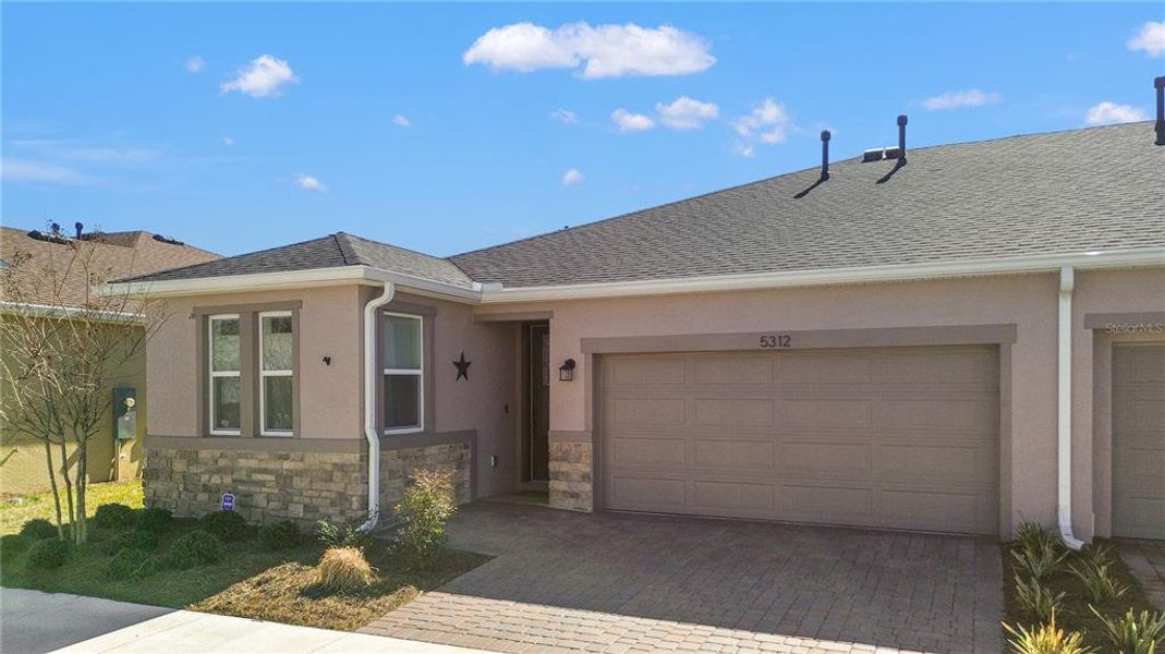 Front exterior of a new home in , Ocala, FL, highlighting curb appeal (Image 22). Front exterior of a new home in , Ocala, FL, highlighting curb appeal (Image 22).