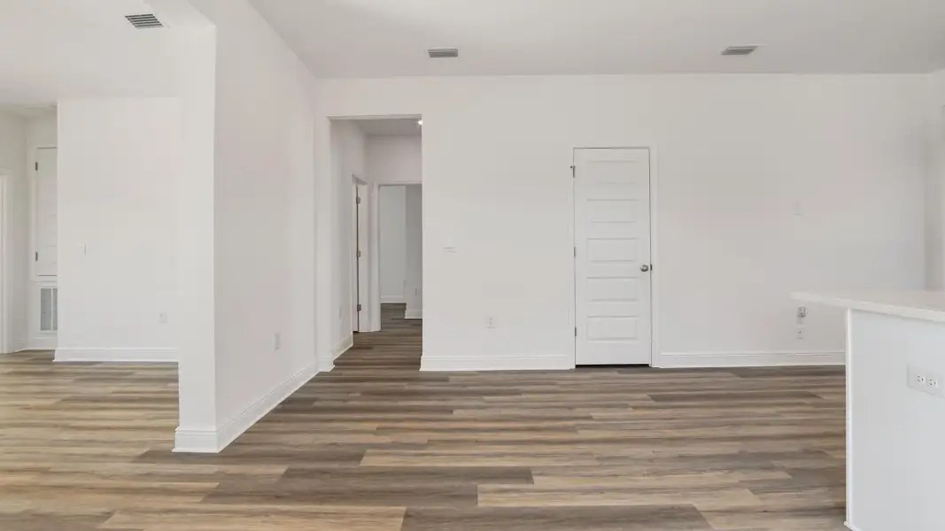 Representative unfurnished interior of a home built from the Oakley by D.R. Horton in Crest Bay Cottages, Miramar Beach (Image 18). Representative unfurnished interior of a home built from the Oakley by D.R. Horton in Crest Bay Cottages, Miramar Beach (Image 18).