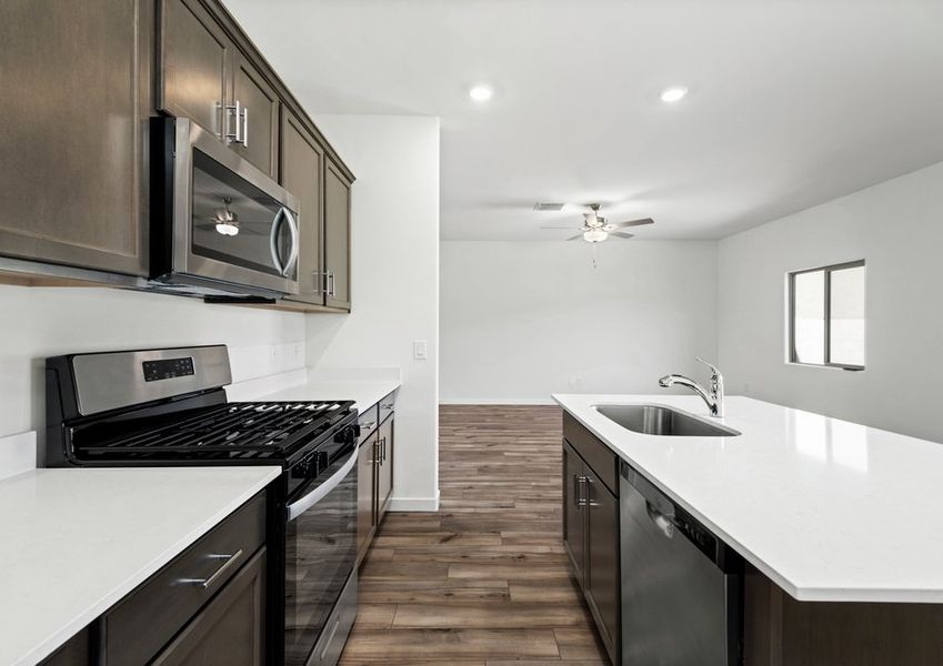 The kitchen flows directly into the living room for convenience and functionality.