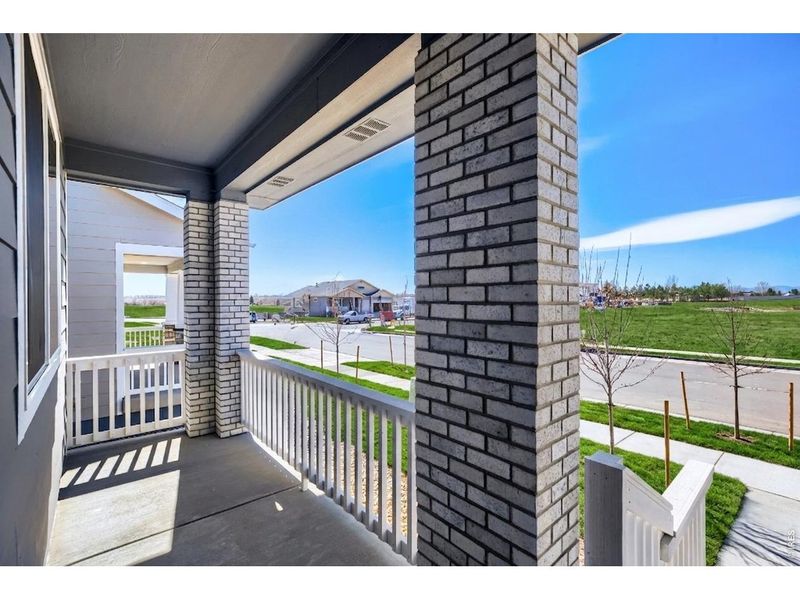 Exterior details and patio area of a home in Farmstead, Berthoud (Image 3).