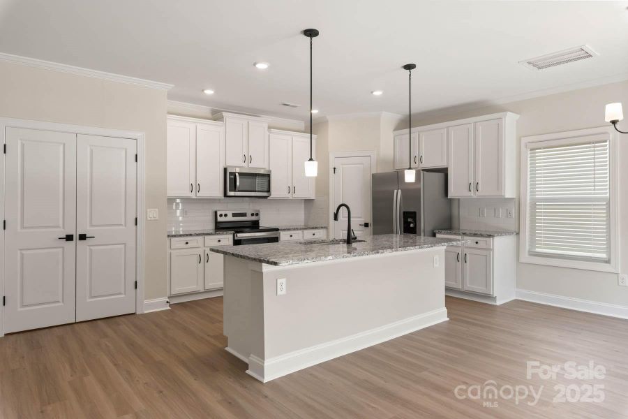 Furnished interior view inside a new home in Village at Granite, Salisbury (Image 8). Furnished interior view inside a new home in Village at Granite, Salisbury (Image 8).