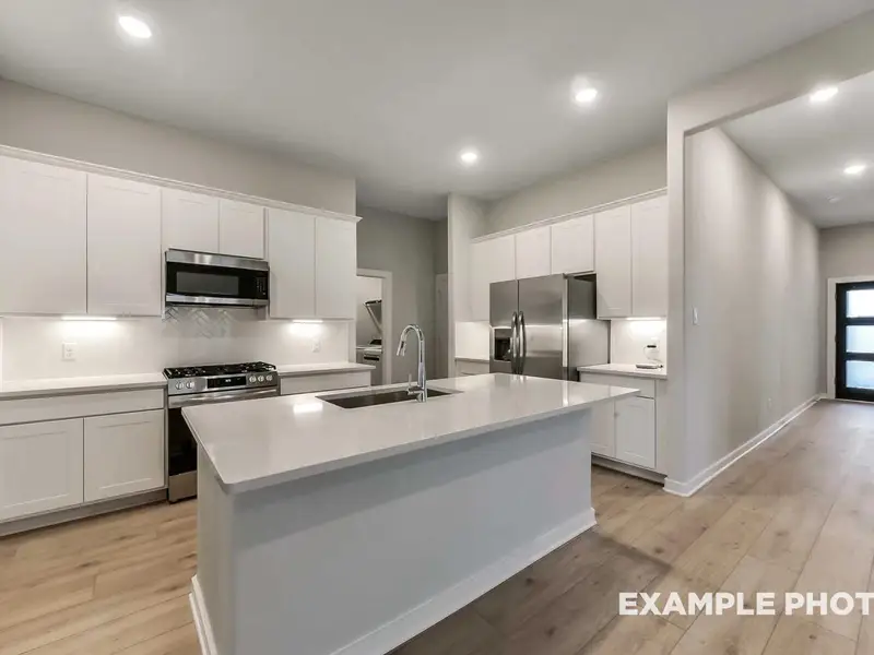 Furnished interior view inside a new home in Enclave at Newport, Crosby (Image 10).