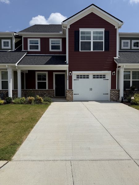 Front exterior of a new home in Legacy Fields, Pleasant View, TN, highlighting curb appeal (Image 2). Front exterior of a new home in Legacy Fields, Pleasant View, TN, highlighting curb appeal (Image 2).